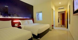 Fariz Hotel - Malang - Bedroom