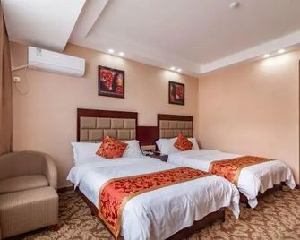 Dingshang Hotel - Ji'an - Slaapkamer