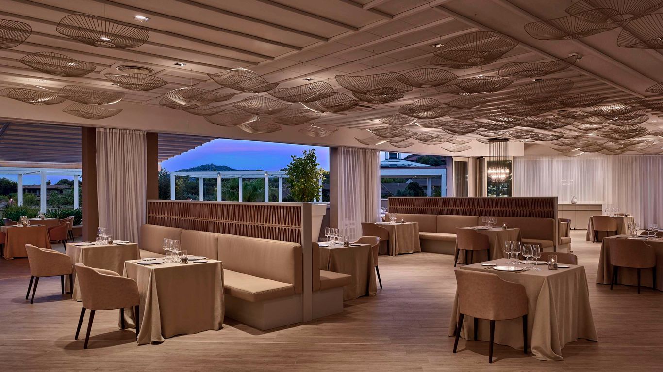 Baia Chia Laguna Resort, Curio Collection by Hilton