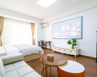 Yisuli Hotel (Dalian Hi-tech Wanda Plaza) - داليان - غرفة معيشة