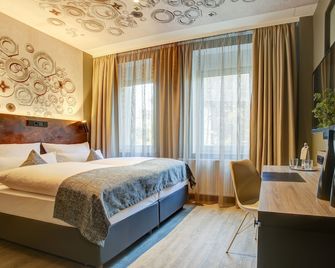 بوتيك إيسين سيتي - ايسن - غرفة نوم