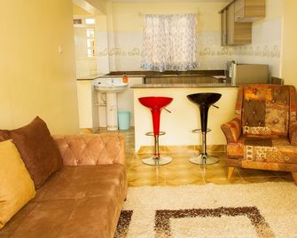 Ashville Homes & Restaurant - Meru - Living room