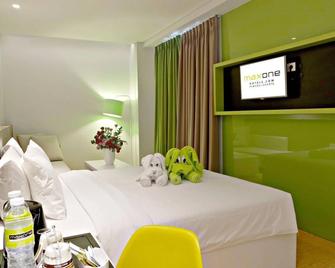 Maxone Hotels At Pemuda - Chse Certified - Jakarta - Bedroom