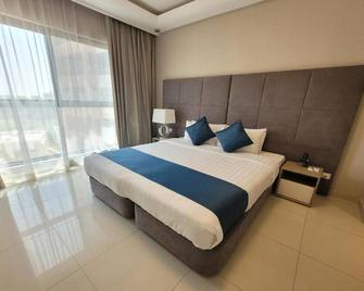 Elegant 1br Deluxe Sunday Luxury Downtown Adliya - Manama - Bedroom