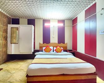 Goroomgo Neelam Raj Near Mall Road Mallital, Nainital - Nainital - Bedroom