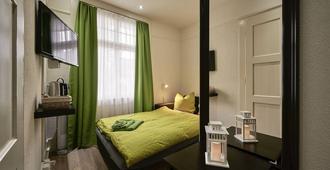 Max Aviation Villa & Apartments - Bern - Schlafzimmer