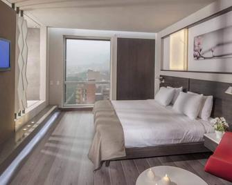 Inntu Hotel - Medellín - Camera da letto