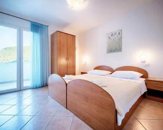 Apartments Bruna Lastovo-Comfort One Bedroom Apartment with Balcony and Sea View-Plavi - Lastovo - Bedroom