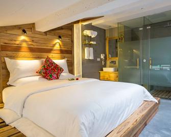 Zhangjiajie Maosao Inn - Zhangjiajie - Makuuhuone