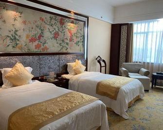Lijing Hotel - Maoming - Bedroom
