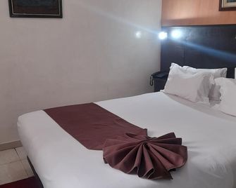 Washington Hotel - Casablanca - Schlafzimmer