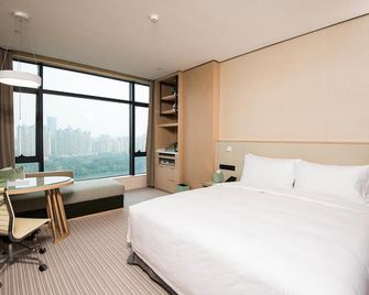 佛山德徠酒店 - 佛山 - 臥室