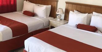 Coningsby Inn - Belize City - Bedroom