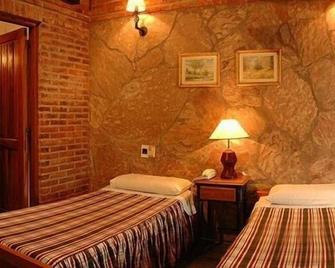 Taormina Hotel - Pinamar - Schlafzimmer