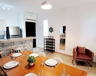 Condo Neuf à Mi-chemin Entre Cancun et Playa del Carmen - 莫雷洛斯港 - 餐廳