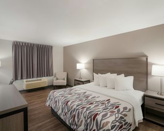 Red Roof Inn & Suites Carrollton, GA - West Georgia - Carrollton - Schlafzimmer