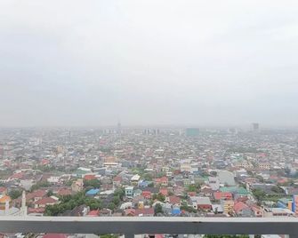 Simply 1Br at 31St Floor Vida View Makassar Apartment - Makassar