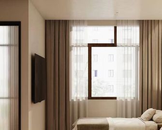 Xingcheng Business Hotel (Heihe Railway Station Branch) - Heihe - Habitación