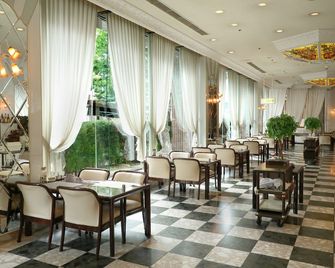 كويو جراند هوتل - سينداي - مطعم