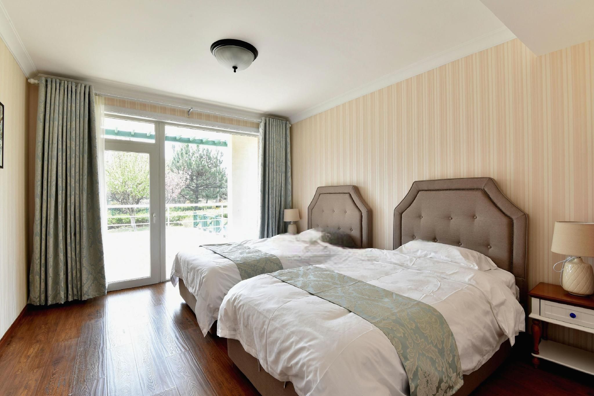 كينج داو أوشن سايد هوتل أند ريزورت - تشينغداو - غرفة نوم