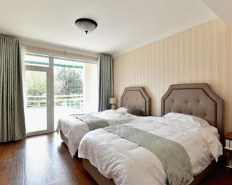 Qingdao Oceanside Hotel & Resort - Qingdao - Sovrum