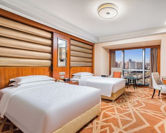 Beijing Xinyuan Hotel - בייג'ין - חדר שינה