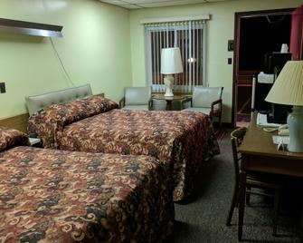 Allen's Budget Motel - Watertown - Camera da letto