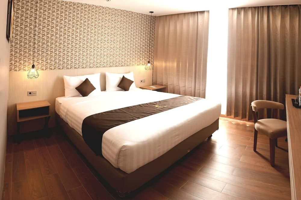 Zenith Premiere Hotel Baubau - Baubau - Schlafzimmer