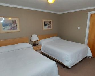 Ross Inn Motel - Lanigan - Bedroom