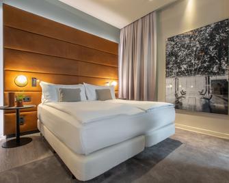 Hilton Garden Inn Mannheim - Мангайм - Спальня