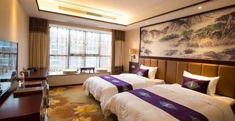Yonghe Tianmen Boutique Hotel - Zhangjiajie - Bedroom