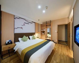 Huangshan Laojiekou Hotel (Tunxi/Liyyang Old Streets Scenic Area) - Huangshan - Bedroom