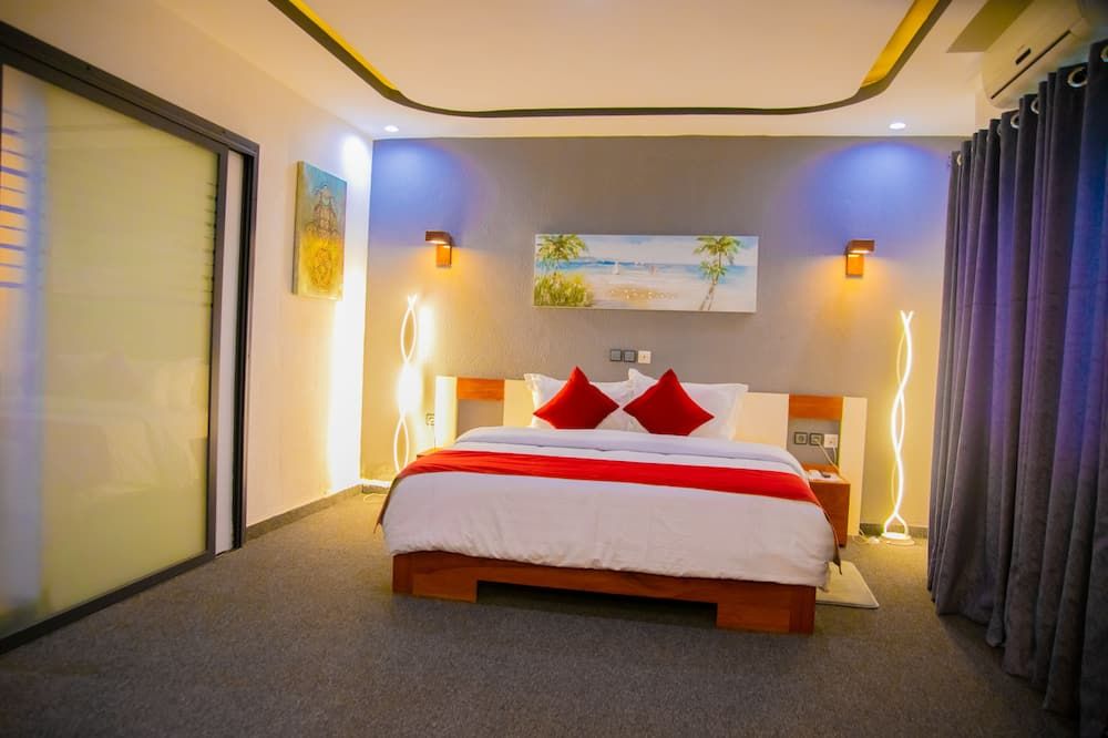 Hotel La Casa Cielo - קוטונו - חדר שינה