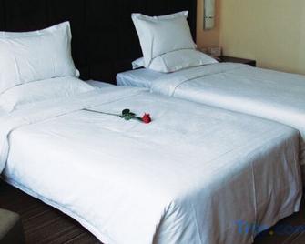 Jianping International Hotel - Chaoyang - Schlafzimmer