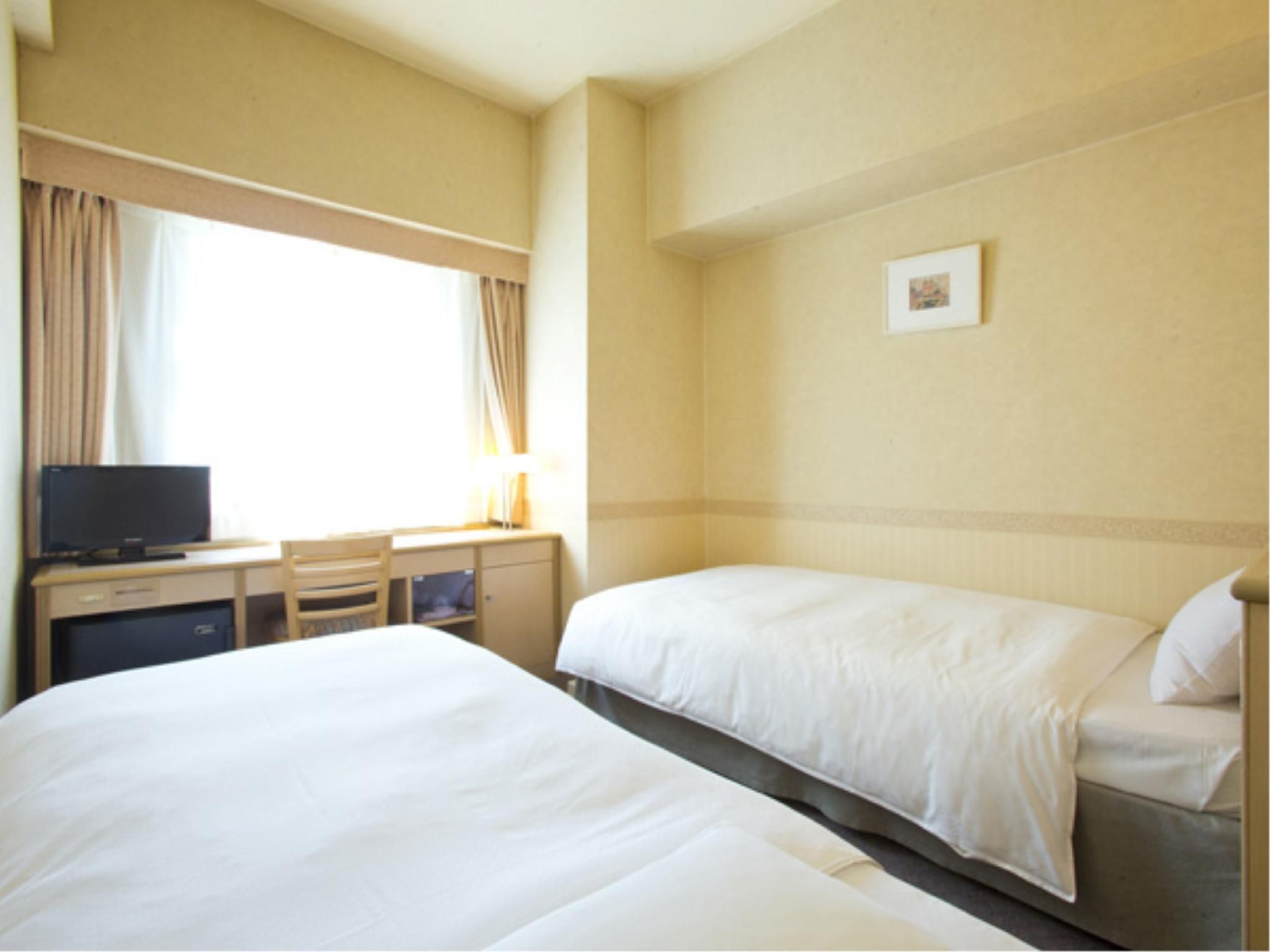 Hotel South Garden Hamamatsu - האמאמטסו - חדר שינה