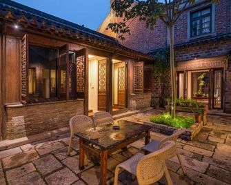 Huaji Hotel - نانجينغ - شرفة مرصوفة