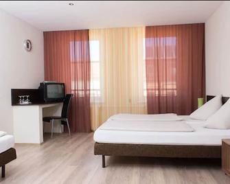 Hotel-Pension Victoria - Berlin - Phòng ngủ