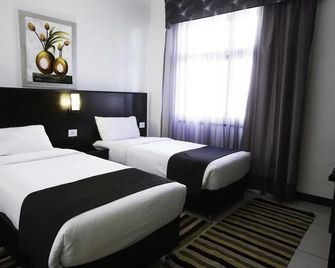 Al Haneen Hotel Apartments - Amman - Bedroom
