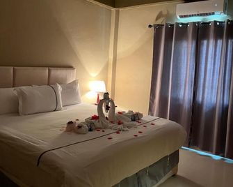 Enjoy Hotel - Caye Caulker - Bedroom