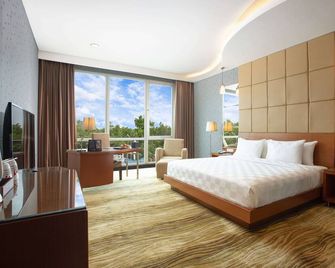 Swiss-Belhotel Kendari - Kendari - Schlafzimmer