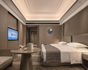 Changsha Yannian Century Hotel - Changsha - Bedroom