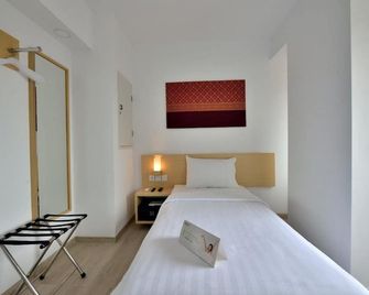 Whiz Prime Hotel Sudirman Pekanbaru - Pekanbaru - Ložnice