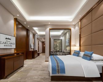 Fei County Inzone Garland Hotel - Linyi - Habitación