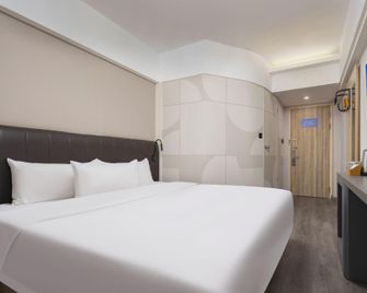 Hanting Premium Hotel Wuhan Guanggu Pedestrian Street Entrepreneurial Center - Wuhan - Bedroom
