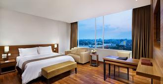 Grand Cakra Hotel Malang - Malang - Yatak Odası