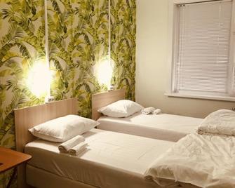 Hostel Ovsyanka - Juzno Sachalinsk - Camera da letto