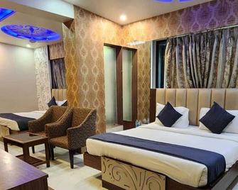 Saibaba International Supreme Hotel - Shirdi - Ložnice