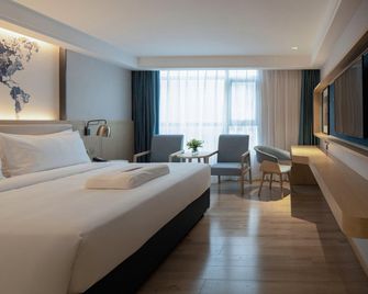 Kyriad Marvelous Hotel Shenzhen Longhua Dalang Business Center - Shenzhen - Bedroom