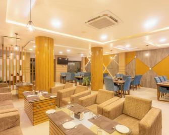 The Sr Hotel - Jogīkuti - Restaurante