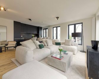 Designer flat 3BR & Mini Golf - Antwerpen - Huiskamer
